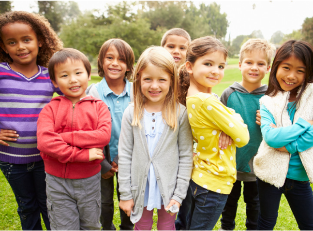 Happy group of children outside
